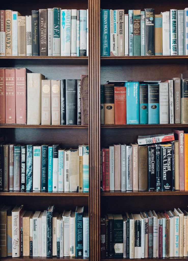 Wooden bookshelves filled with library books