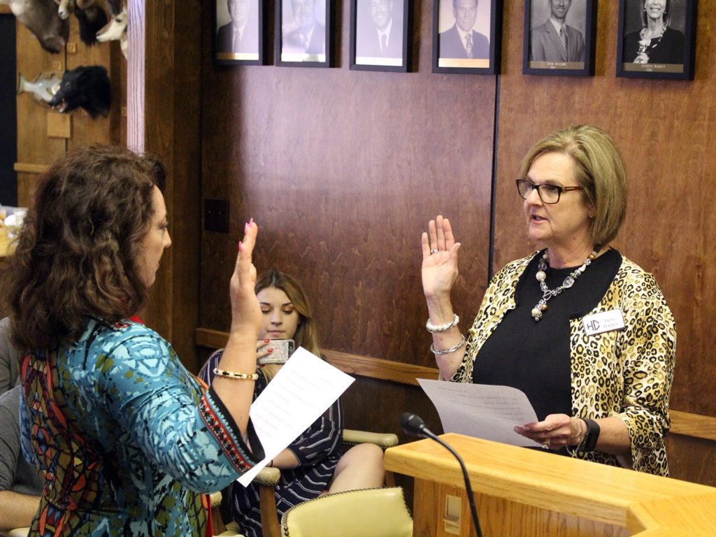 Image of Emma Krabill being sworn-in to Board of Trustees